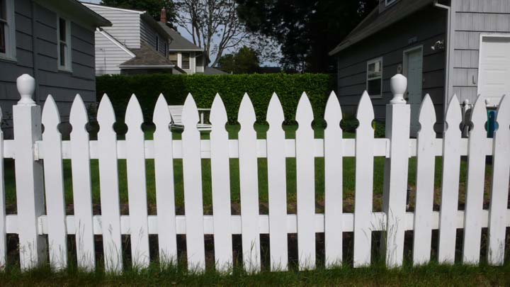 Photo of white picket fence
